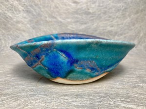 Kommetje turquoise met tekening.