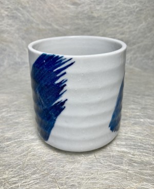 Theetas met blauwe veeg.