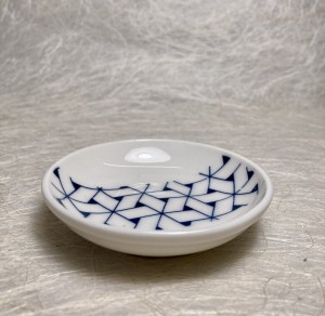 bordje met blauwe tekening.