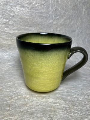 Mug Tas geel met zwarte rand.
