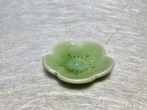Bordje mini groene bloem.